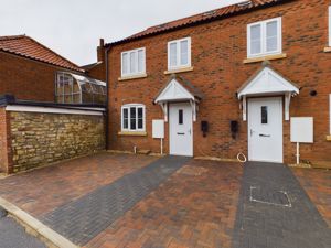 Main elevation- click for photo gallery